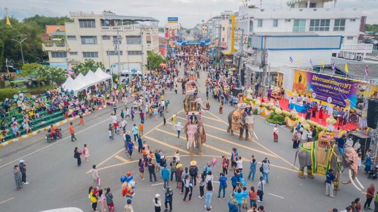 A Majestic Splendor Unfolds: 53 Elephants Grace the Candle Parade in Surin Province